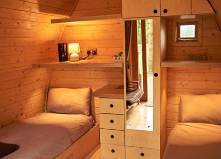 Inside a Pinewood glamping pod at Port Lympne Hotel and Reserve in Kent