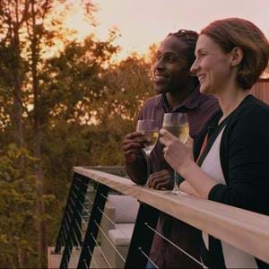Enjoy drinks on your Treehouse balcony at Port Lympne Reserve, Kent, as the sun goes down