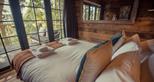 The master bedroom with a 30 mile view to the Kent coast at Tiger Lodge