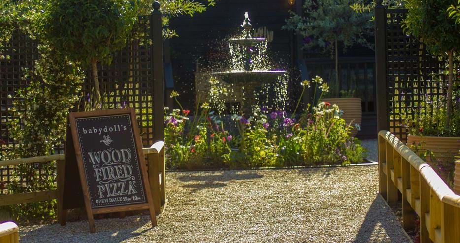Italian style gardens at Babydoll's Wood Fired Pizza restaurant at Port Lympne Hotel and Reserve in Kent