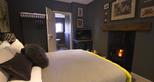 Downstairs bedroom at Rhino Lodge