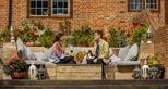 Enjoy a glass of wine on the deck at Rhino Lodge