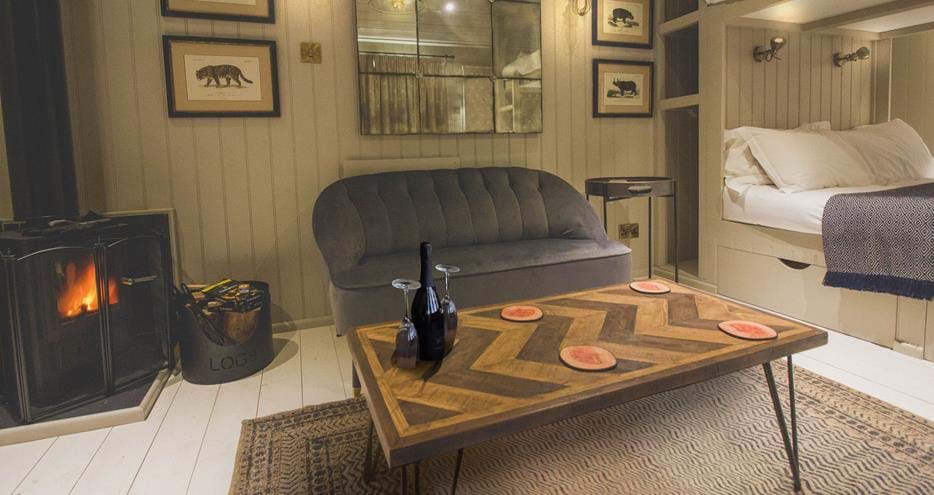 Living area of your shepherd hut at Hog Deer Creek at Port Lympne Hotel & Reserve in Kent