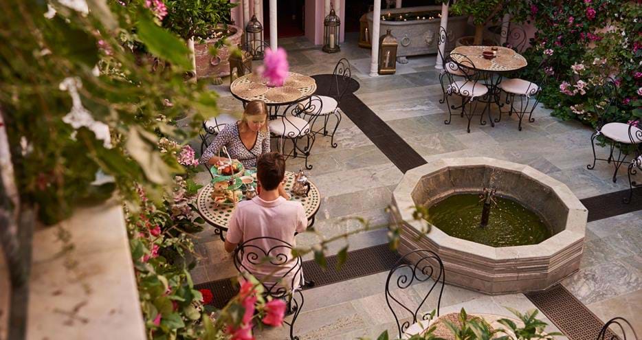 Afternoon tea on the Moroccan Courtyard at Port Lympne Hotel in Kent