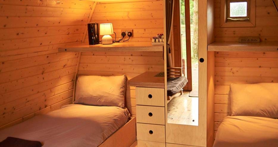 Inside a Pinewood glamping pod at Port Lympne Hotel and Reserve in Kent