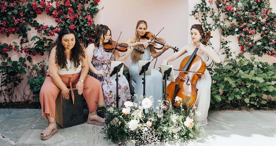 Quartet perform on the Moroccan Courtyard wedding venue at Port Lympne Hotel & Reserve. Rebecca Carpenter Photography
