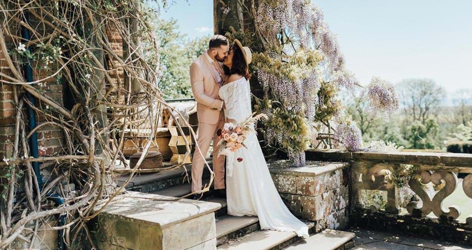 Happy couple at Port Lympne Hotel country wedding venue in Kent, UK. By Rebecca Carpenter Photography