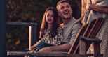 Dad and daughter enjoy the sunset at Hog Deer Creek at Port Lympne Hotel & Reserve in Kent
