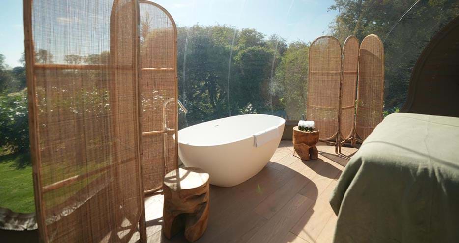 Freestanding bath tub in the Lookout Bubble glamping accommodation at Port Lympne Reserve in Kent