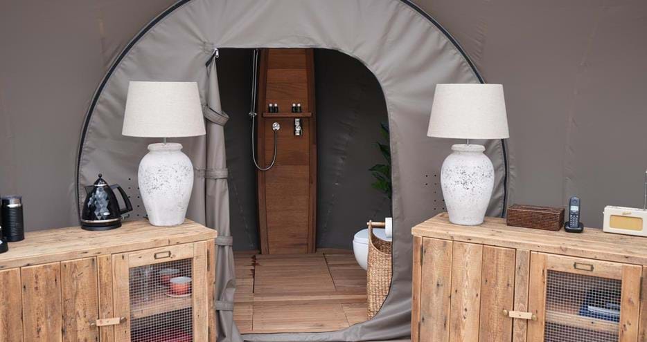 Shower room at the Lookout Bubble glamping accommodation at Port Lympne Reserve in Kent