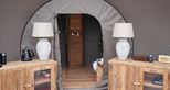 Shower room at the Lookout Bubble glamping accommodation at Port Lympne Reserve in Kent