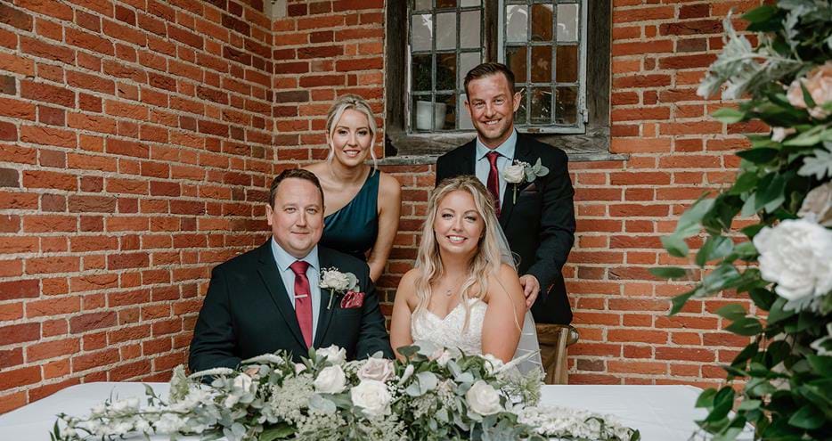 Witnesses with the happy couple at a wedding at Port Lympne Hotel & reserve in Kent