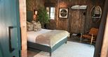 Lion Lodge master bedroom at Port Lympne Hotel & Reserve in Kent