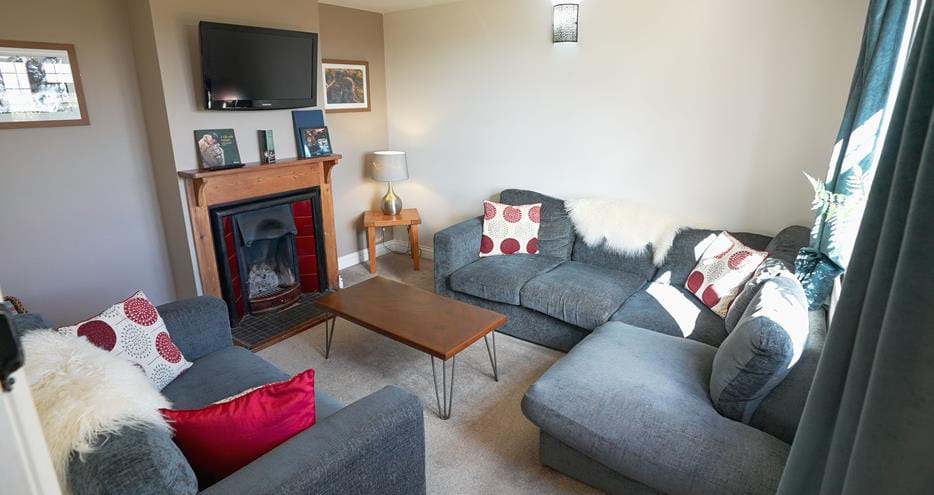 The snug at Giraffe Cottage safari getaway at Port Lympne Hotel & Reserve in Kent