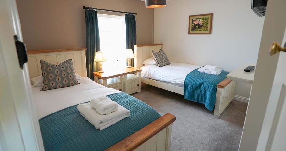 Kids twin room at Giraffe Cottage safari getaway at Port Lympne Hotel & Reserve in Kent