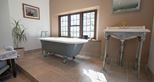 Bathroom at Giraffe Cottage safari getaway at Port Lympne Hotel & Reserve in Kent