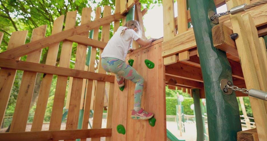 Climbing wall at Joshi's Jungle playground at Howletts Wild Animal Park in Kent